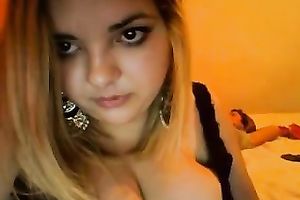 Nice large boobed girlie posing seductively whilst on livecam with me