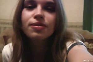 Exclusive juvenile chick with large face hole disrobes on the ottoman