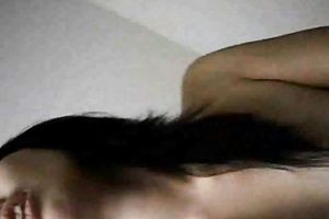 Slender dark haired Asian girlfriend enjoys coarse missionary sex