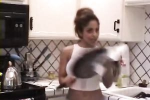Sporty brunette hair Indian wife shows me her massive fake bazookas in kitchen