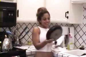Sporty brunette hair Indian wife shows me her massive fake bazookas in kitchen