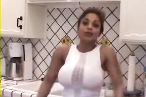 Sporty brunette hair Indian wife shows me her massive fake bazookas in kitchen