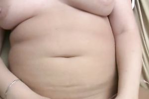 Curvy chunky golden-haired with chunky pantoons plays with toys