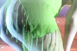 Blonde non-professional hottie in toxic green outfit shows her arse