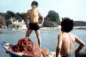 Awesome woman with tremendous body receives pushed on the beach