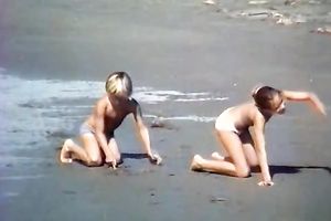 Awesome woman with tremendous body receives pushed on the beach