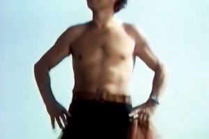 Awesome woman with tremendous body receives pushed on the beach