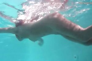 Mesmerizing redhead teenie from Russian Federation shows her body