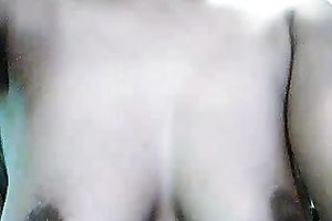 Busty and pretty dark honey flashes her tits on web camera