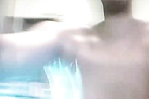 Busty and pretty dark honey flashes her tits on web camera