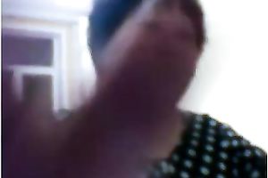 Chinese granny with massive titties flashes 'em on camera