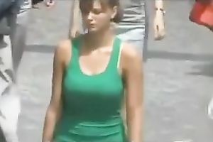 Juicy boobies of dilettante ladies walking down the street