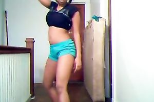 Slim ebon legal age teenager dancing seductively in front of camera