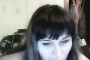 Just a brunette hair girlfriend shows her pussy on web camera