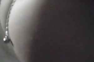 Glamorous brunette hair slutty wife shows off her large ass in hot dark belts