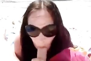 Cute brunette hair latin chick milf enjoys my penis on the beach