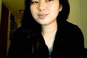 Asian juvenile cutie rubs her snatch and teats on cam