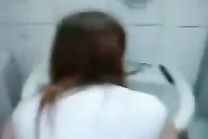 Dyed red haired pale nympho with hot large rack was drilled in the toilet