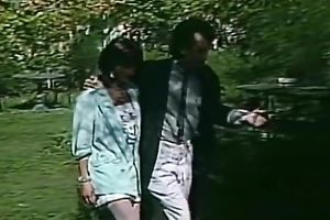 Two classic white brunettes in the old style bathtub