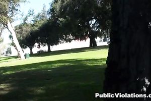 Beautiful skanky legal age teenager in the park giving head below the tree