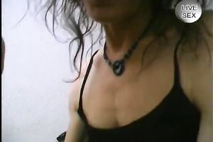 Insane dark brown older slut masturbates with bottle