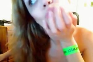 Eye catching zealous auburn web camera chick plays with her constricted boobies