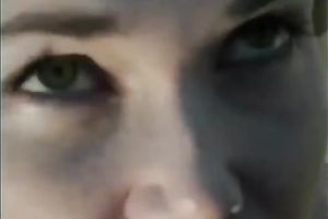 Cute golden-haired playgirl gives oral-stimulation to a white dude outside