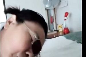 Chubby Asian milf in sunglasses blows curly white knob of her fellow