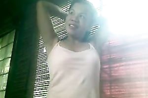 Lovely non-professional Asian nympho showed off her quite large boobies to me