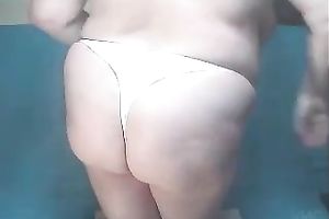 Huge boobed granny playing with her pussy in solo video