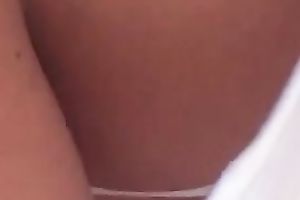 Coed's charming tank top cleavage as that babe talks on a phone