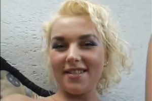 Curly light-haired whore rubs her juicy love tunnel on the bed