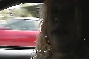 Blonde hirsute haired white woman on the daybed eating 10-Pounder