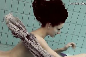 Cute European teenie caught on livecam in the pool underwater