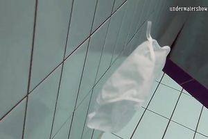 Cute European teenie caught on livecam in the pool underwater