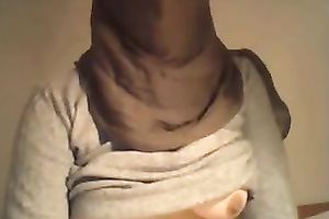 Lewd web camera chick flashes her boobies and tickles her own snatch