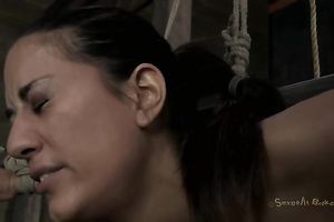 Hogtied titless tanned brunette hair acquires hung above the floor