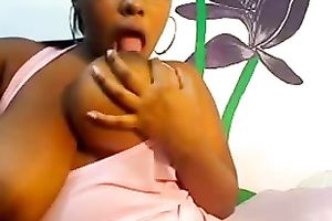 Kinky large breasted non-professional black honey brags of her giant boobies