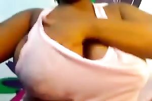Kinky large breasted non-professional black honey brags of her giant boobies
