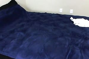 Short-haired gal in college uniform undresses and tickles her pussy