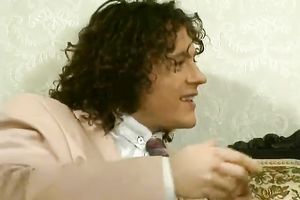 Two elegant white European milfs on the bed with their studs