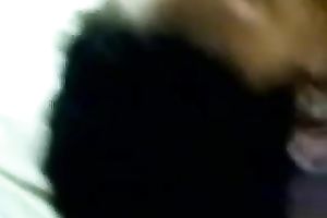 Ebony hooker engulfing large white cock balls unfathomable in non-professional video