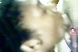 Ebony hooker engulfing large white cock balls unfathomable in non-professional video