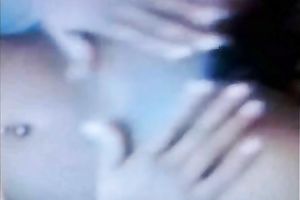 My bosomy black skinned girlfriend caresses her juicy muff with hands