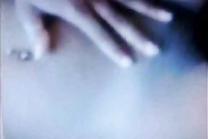 My bosomy black skinned girlfriend caresses her juicy muff with hands