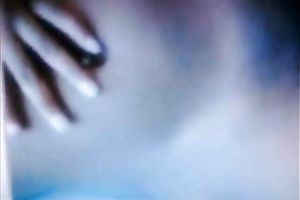 My bosomy black skinned girlfriend caresses her juicy muff with hands