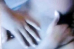 My bosomy black skinned girlfriend caresses her juicy muff with hands