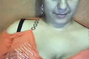Mature dark skin Mexican white lady flashes her large hairless love tunnel
