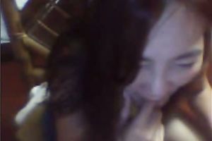 Mature Asian woman shows off her teats and touches her punani