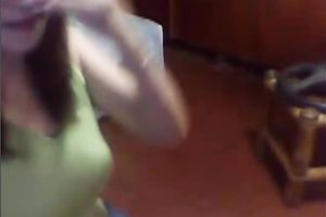 Mature Asian woman shows off her teats and touches her punani